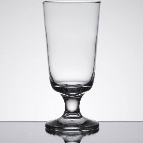 A close-up of an Anchor Hocking Excellency highball glass with a small rim.