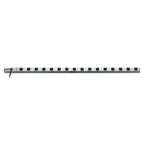 A long rectangular silver metal Tripp Lite power strip with black square outlets.