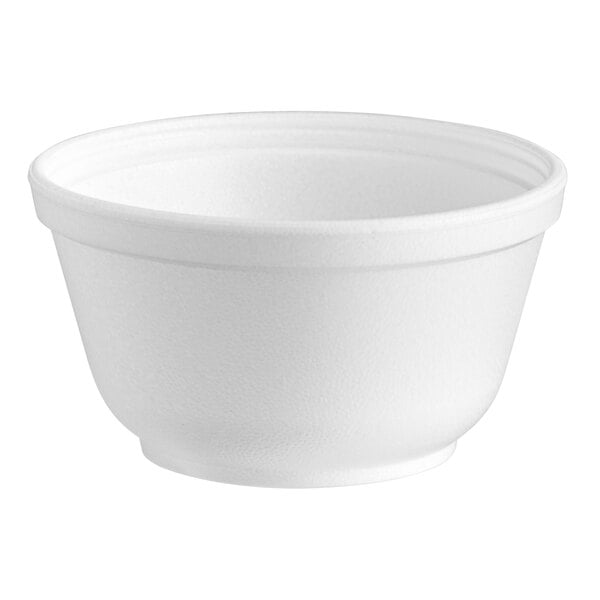 A close-up of a Dart white styrofoam bowl.