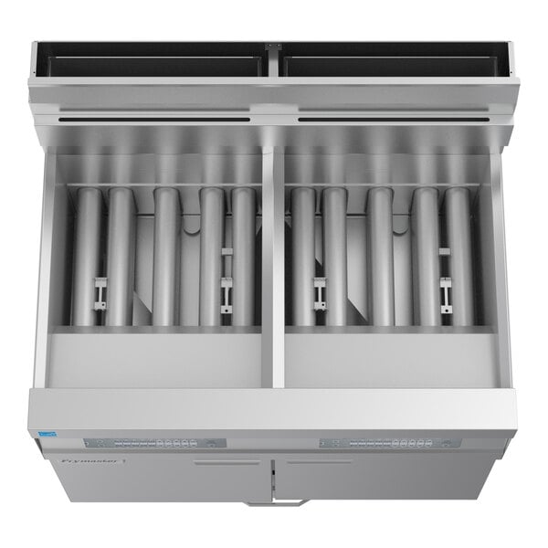 A commercial double-unit floor fryer with oil-conserving and filtration system features.