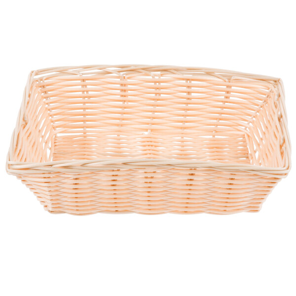 A beige rectangular woven rattan basket with handles.