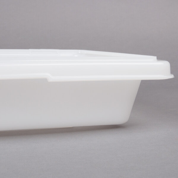 A Rubbermaid white polyethylene food storage box with lid.