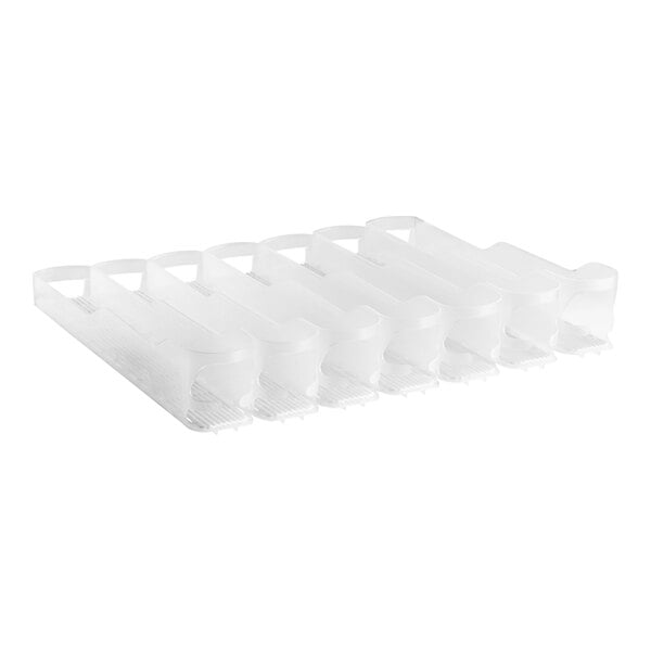 A clear plastic Trueflex bottle organizer with 7 lanes.