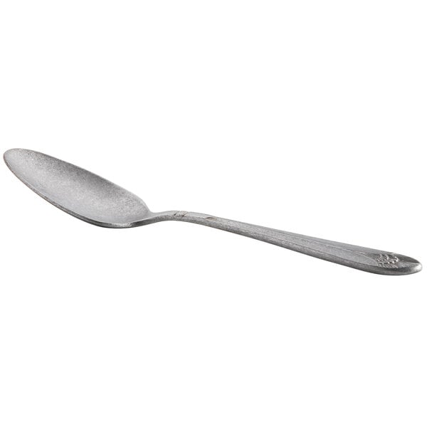 A Libbey stainless steel teaspoon with a silver handle and spoon.