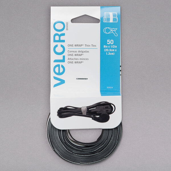 A package of 50 black Velcro One-Wrap thin ties with black hook and loop fasteners.