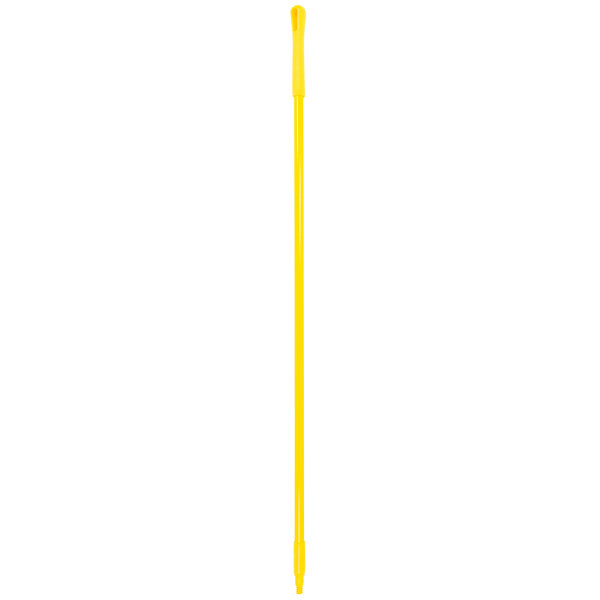 A yellow Carlisle fiberglass stick with threads on the end.