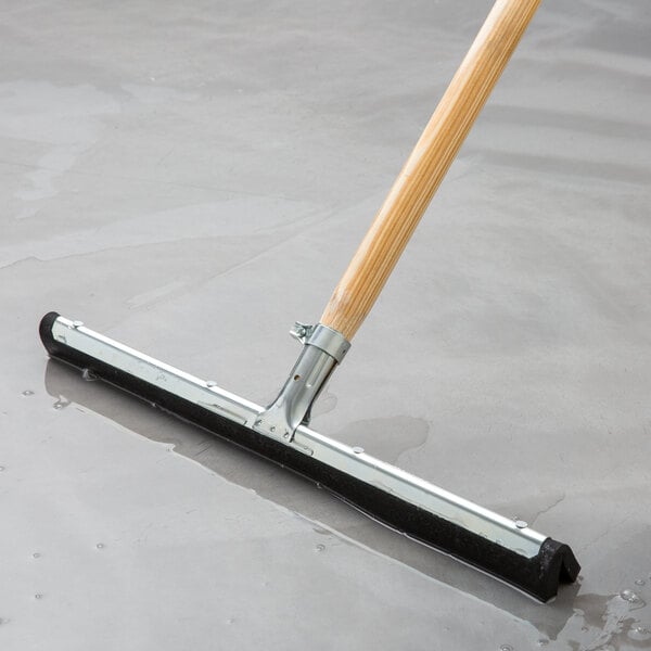 Double foam rubber floor squeegee cleaning up water