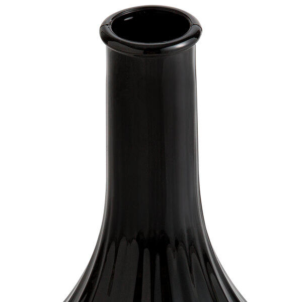 A black Cambro bud vase.