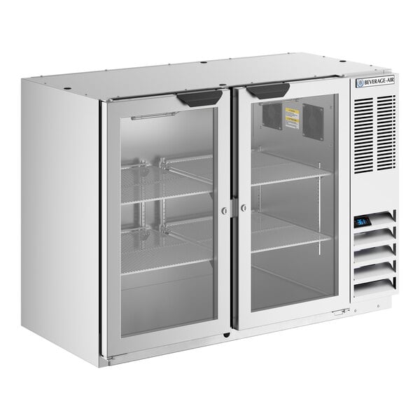 A stainless steel underbar height back bar refrigerator with two glass doors and interior shelving.