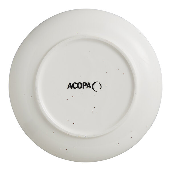 A white Acopa stoneware coupe plate with black text that says "Vanilla Bean" on it.