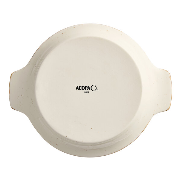 A round, white porcelain casserole dish with handles, shown upside down with the Acopa brand name on the bottom.