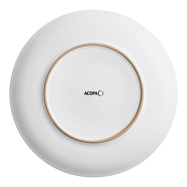 A white stoneware coupe plate with a brown rim.