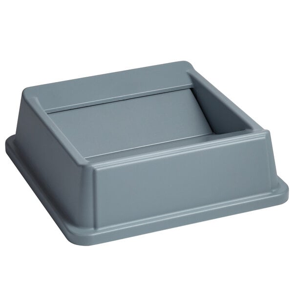 A grey Rubbermaid Untouchable trash can lid with a hole in it.