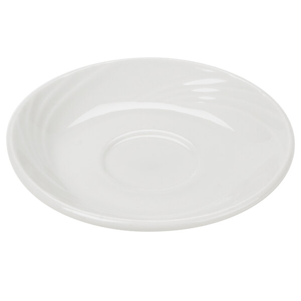 A white porcelain saucer with a white rim.