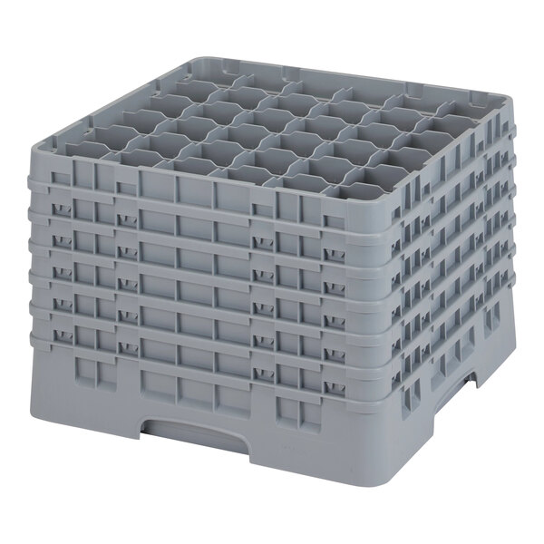 A grey plastic Cambro glass rack with many compartments.
