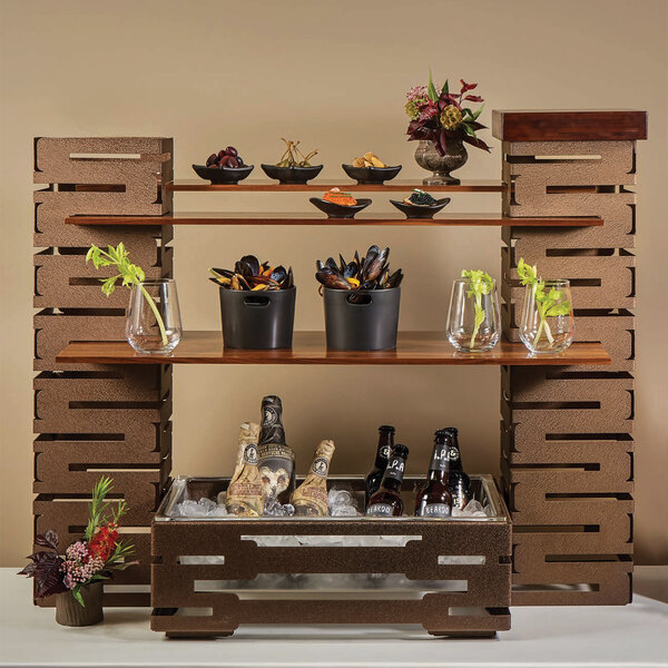 A Rosseto dark bamboo shelf holding glasses and bottles.