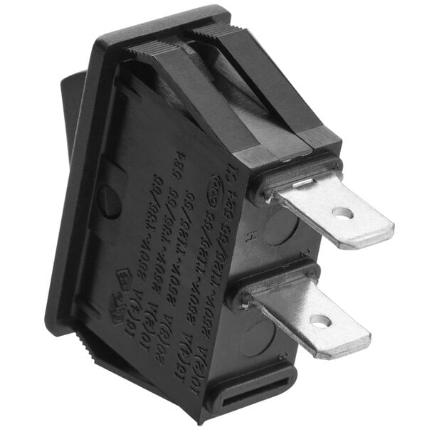 a black electrical device with metal terminals