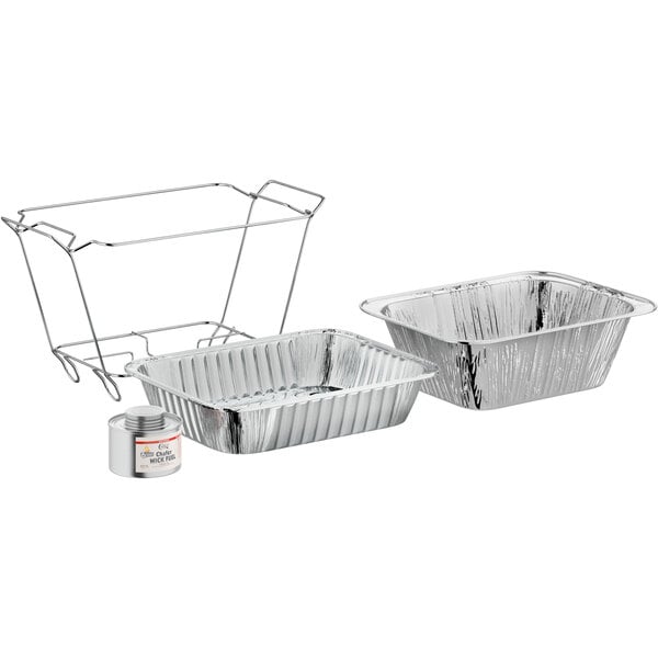 A metal tray holding silver food containers with black wick fuel.