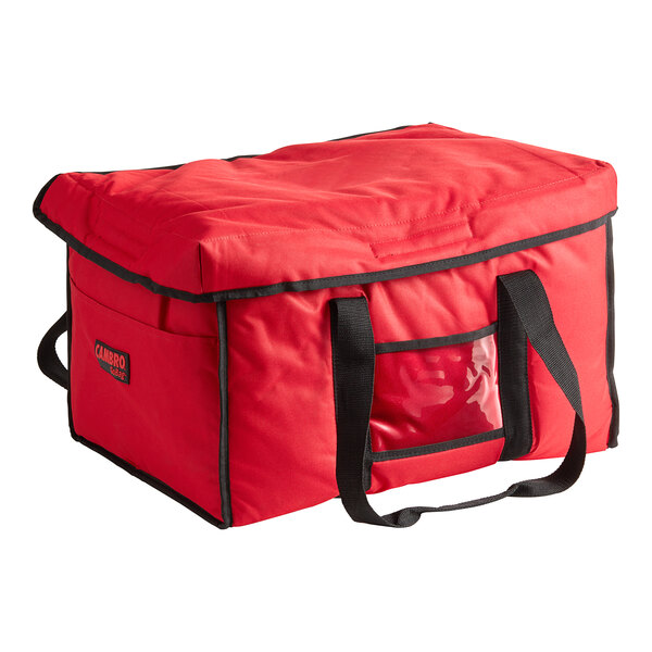 A red Cambro insulated delivery bag with black straps.