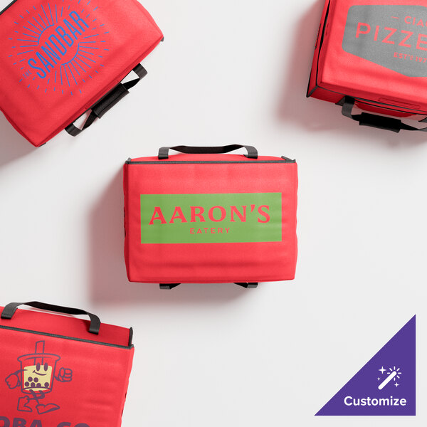 A group of red Cambro insulated delivery bags with blue text.