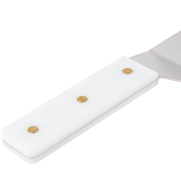 A white spatula with a white handle.
