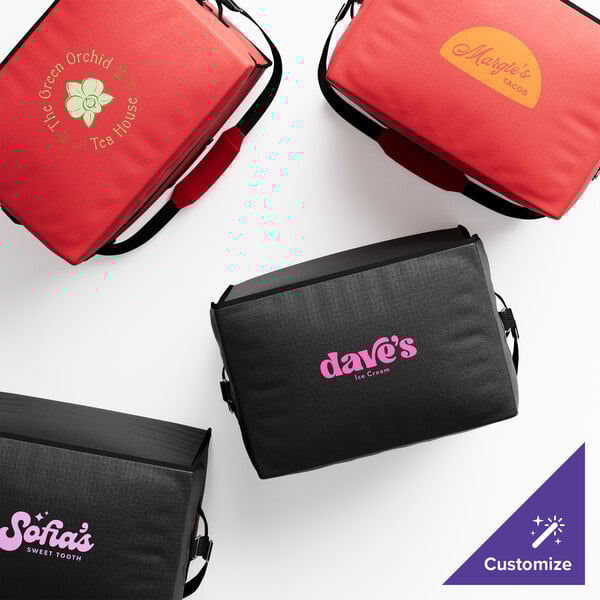 A group of black Cambro insulated delivery bags with yellow text.