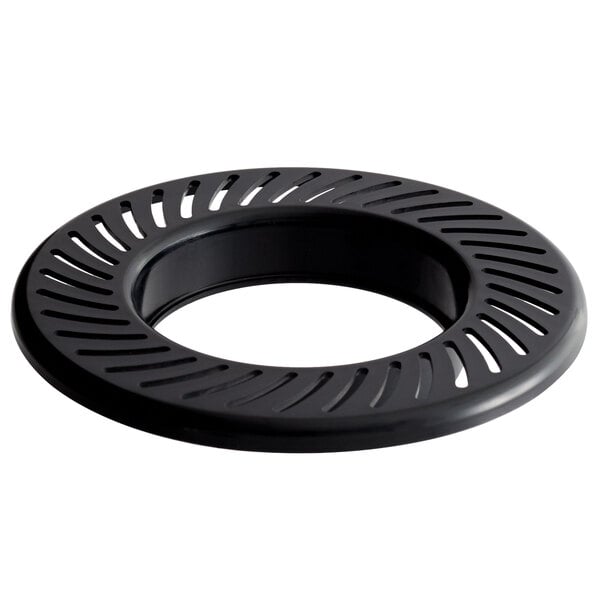 a black circular object with holes
