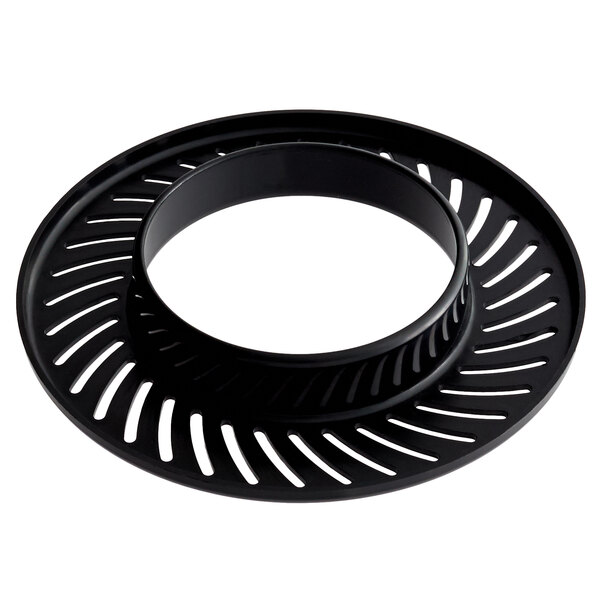 A black circular pulp strainer with holes for an AvaMix juicer.
