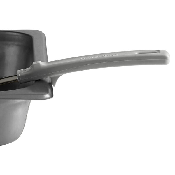 A pan with a Vollrath Spoodle with a gray handle.