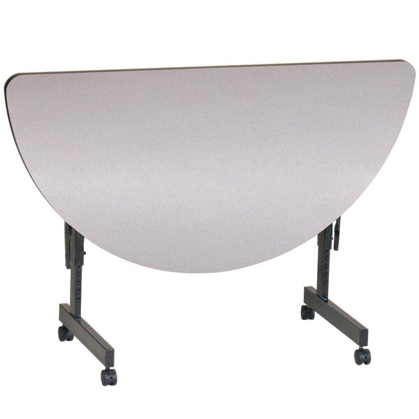 A white Correll half round table with wheels.