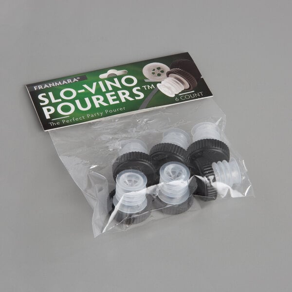 A package of six green plastic bags with black and white plastic caps.
