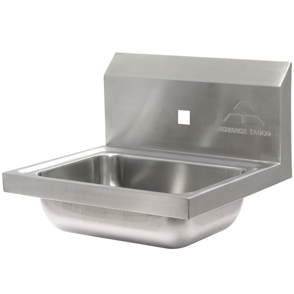 a stainless steel sink with a square hole