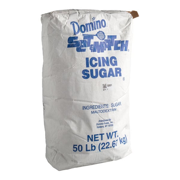 A white bag of Domino Confectioners Icing Sugar.