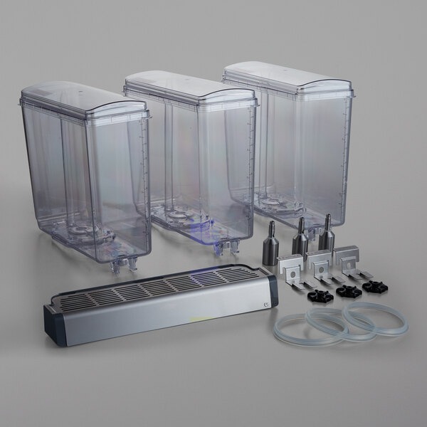 A group of clear Crathco containers with metal parts.