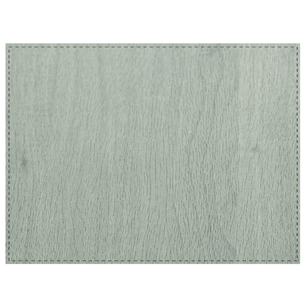 A close-up of a faux wood surface with a white background.