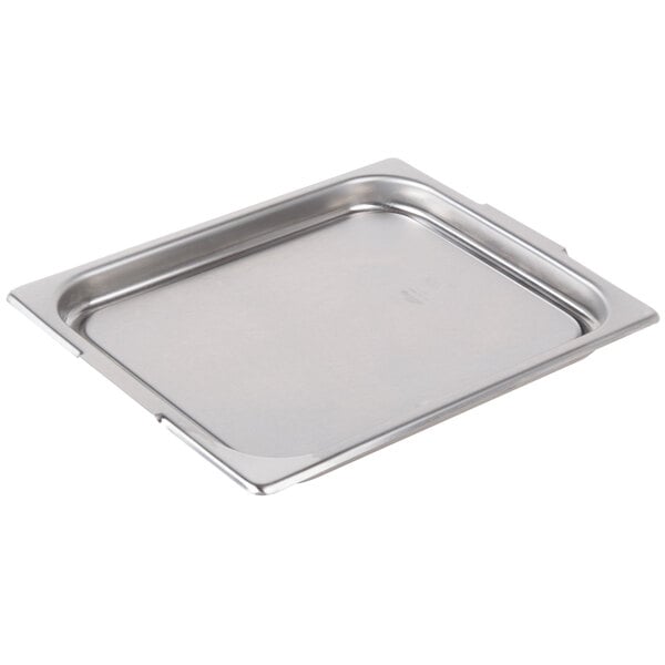 A Vollrath stainless steel tray with a lid.
