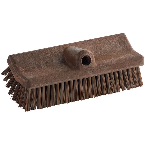 A Carlisle Sparta brown floor scrub brush with a handle.