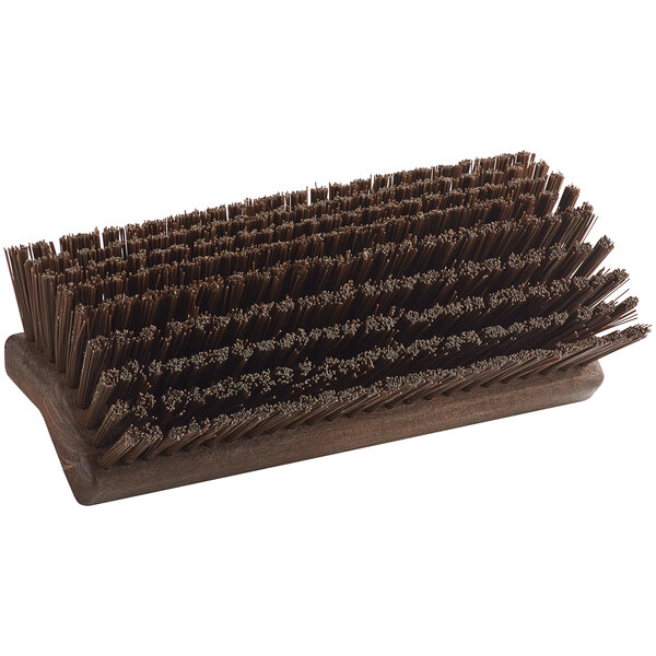 a brown brush with many bristles