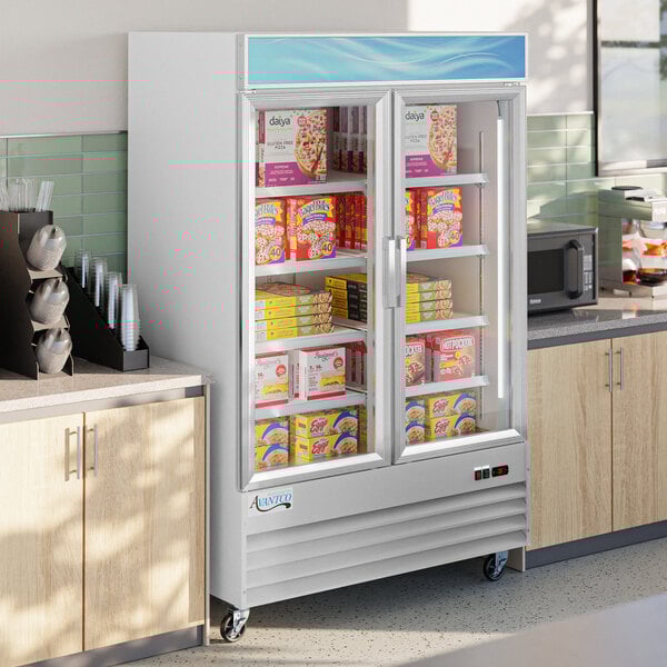 An Avantco swing glass door merchandiser freezer with a white exterior.