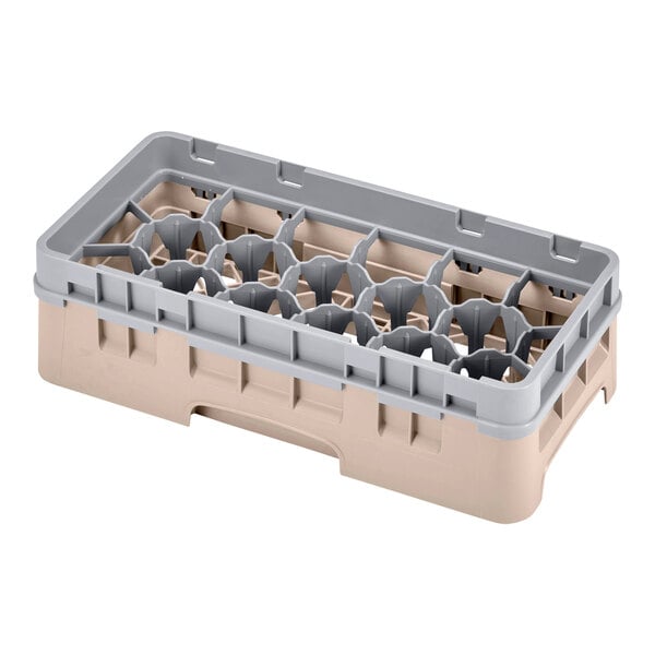 A beige plastic Cambro half size glass rack with 17 compartments and an extender.