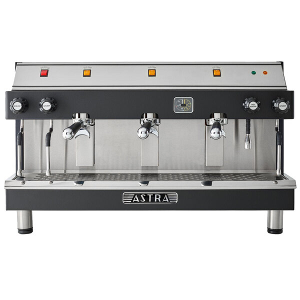 A black and silver Astra Mega III semi-automatic espresso machine with three taps.