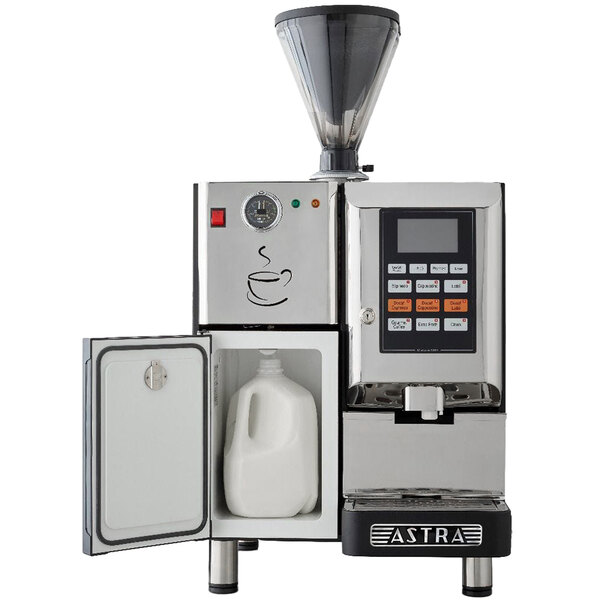An Astra Super Mega automatic coffee machine with a white jug of milk.