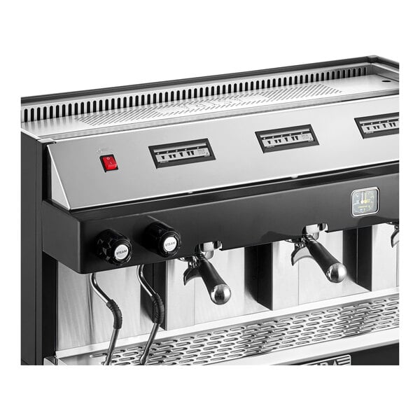 A commercial stainless steel automatic espresso machine with multiple group heads and steam wands.