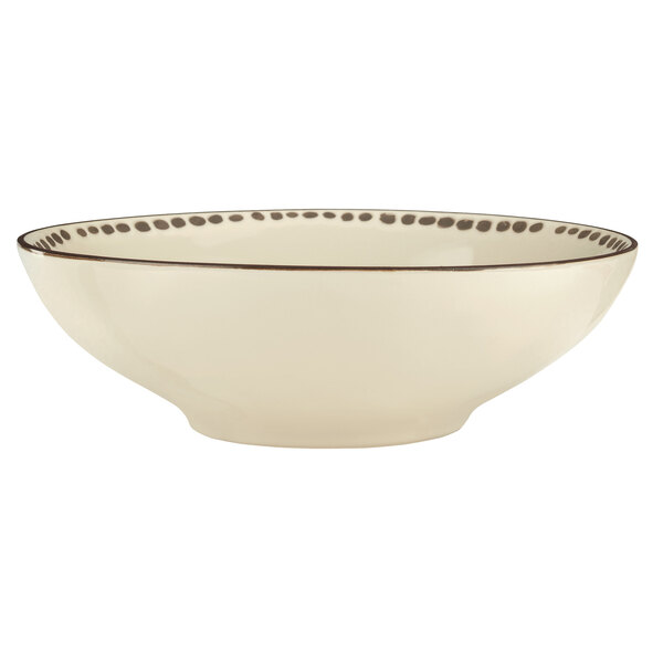 A white Libbey stoneware soup bowl with black trim.