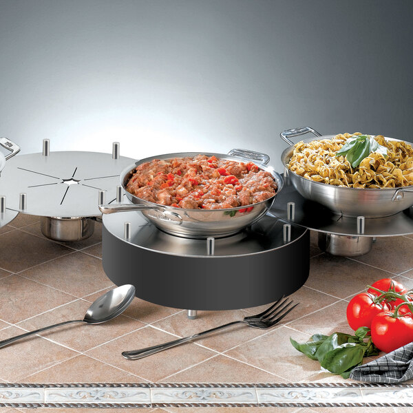 A Bon Chef high linking chafer alternative with food on it.