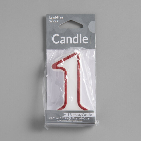 A white and red outlined number "1" birthday candle in a package.