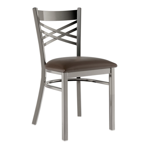 A Lancaster Table & Seating metal cross back chair with a dark brown vinyl padded seat.