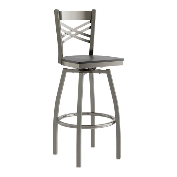A Lancaster Table & Seating metal swivel bar stool with a black wood seat and a clear coat finish.