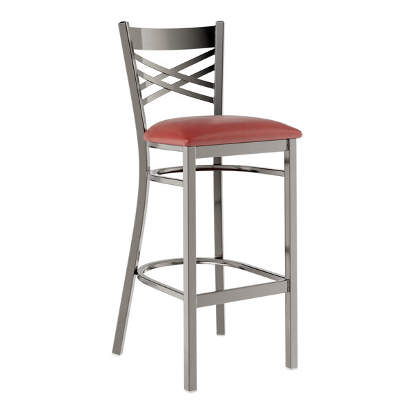 A Lancaster Table & Seating clear coat metal bar stool with burgundy vinyl padded seat.