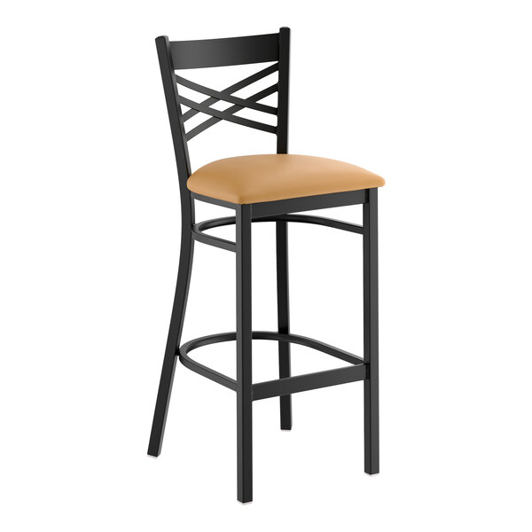 A black metal bar stool with a cross back design and a light brown vinyl padded seat.
